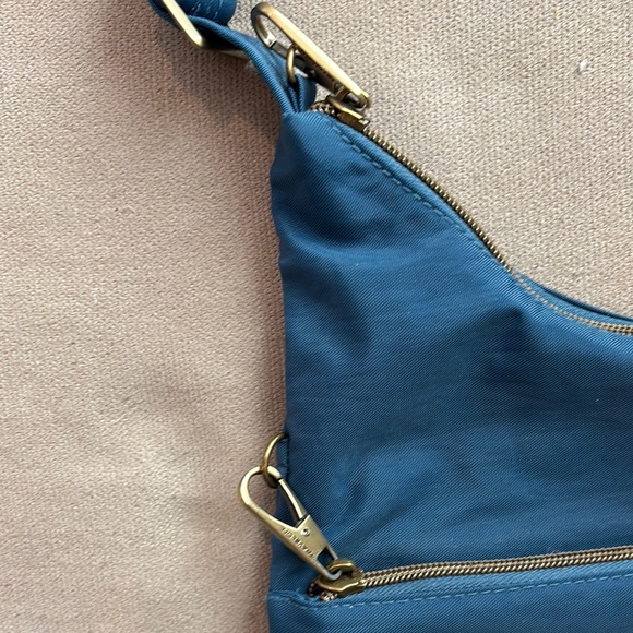Travelon Blue Crossbody Bag with Adjustable Strap and Soft Fabric - Picture 9 of 9